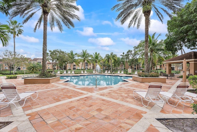 community pool with a patio