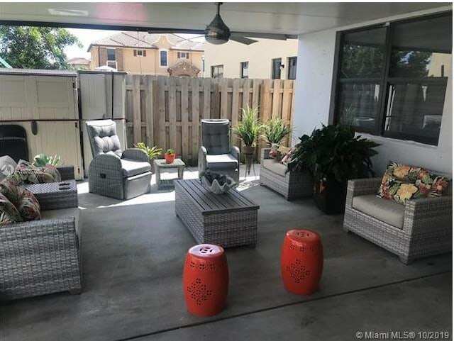 view of patio / terrace with fence and an outdoor hangout area