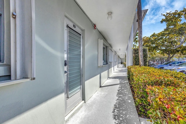 view of side of home featuring stucco siding