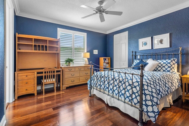 bedroom with wood-type flooring, a closet, ornamental molding, and a textured ceiling