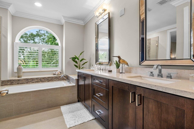 bathroom featuring a garden tub, ornamental molding, and a sink