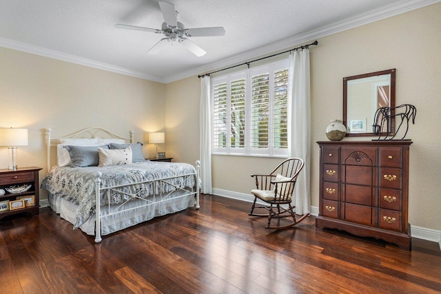 bedroom with baseboards, ceiling fan, hardwood / wood-style flooring, and crown molding