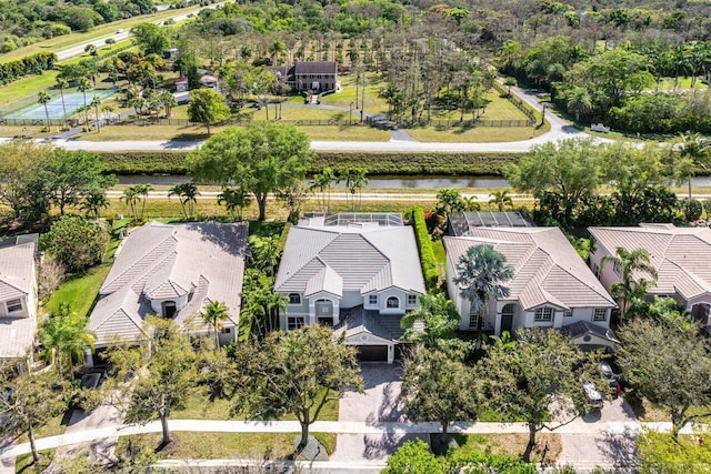 aerial view featuring a water view and a residential view