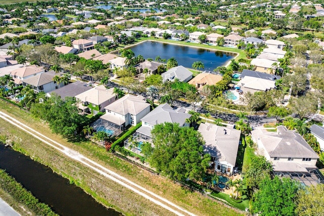 bird's eye view with a residential view and a water view