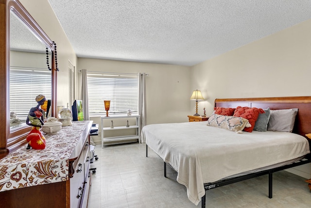 bedroom with a textured ceiling