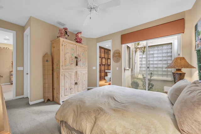 bedroom with connected bathroom, light carpet, visible vents, baseboards, and access to outside