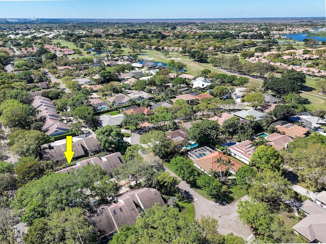 aerial view featuring a water view and a residential view