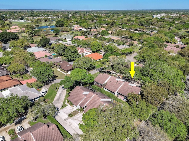 aerial view with a residential view and a water view