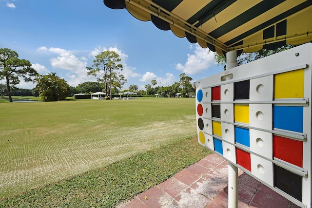 view of yard featuring mail area