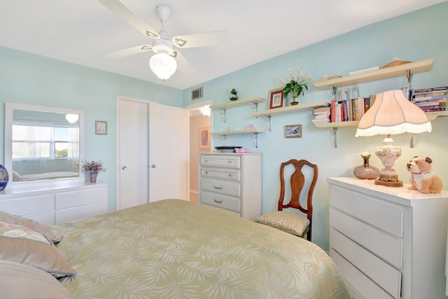 bedroom with a ceiling fan and visible vents