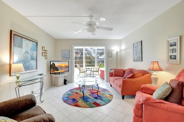 living room featuring light tile patterned floors and ceiling fan