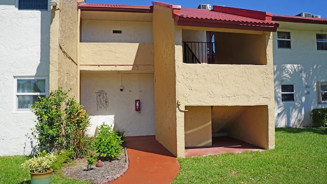 exterior space with stucco siding