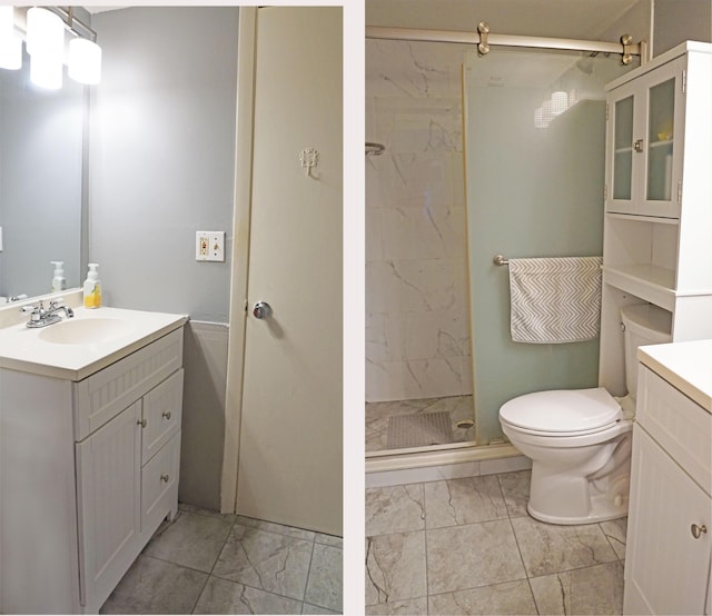 bathroom featuring toilet, marble finish floor, a marble finish shower, and vanity