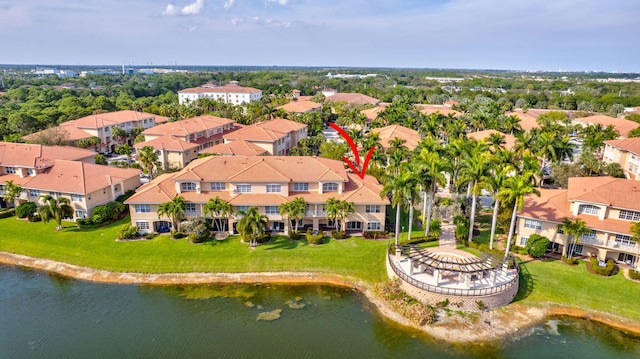 bird's eye view with a water view and a residential view