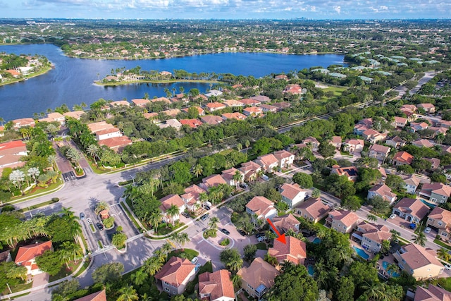 bird's eye view featuring a water view and a residential view