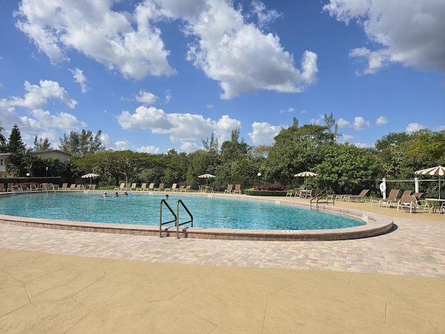 pool featuring a patio area