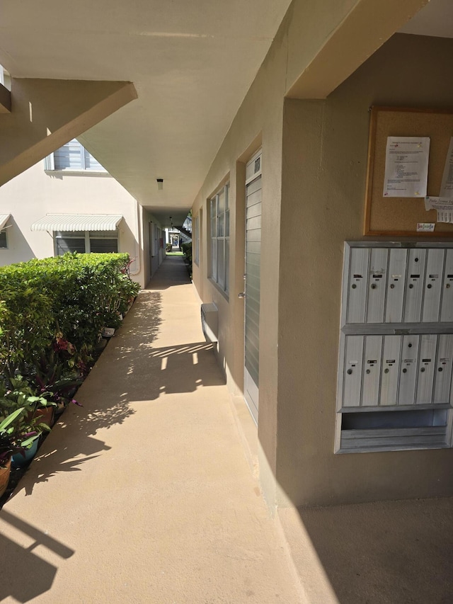 view of patio with mail area