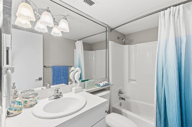 bathroom with toilet, shower / bath combo, visible vents, and vanity