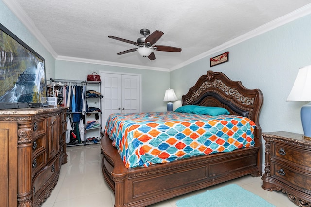 bedroom with light tile patterned floors, ceiling fan, a textured ceiling, and crown molding