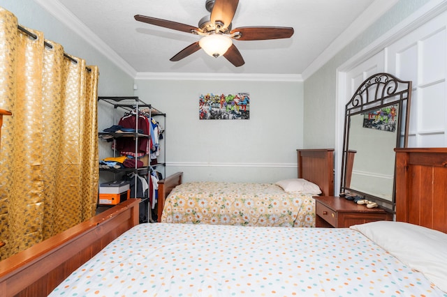 bedroom with ornamental molding and a ceiling fan