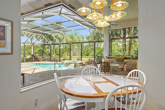 sunroom / solarium with a healthy amount of sunlight