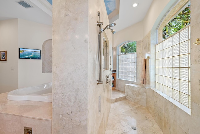 bathroom with recessed lighting, visible vents, a sink, and walk in shower