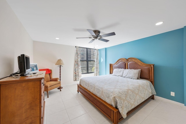 bedroom featuring ceiling fan, recessed lighting, light tile patterned flooring, and baseboards