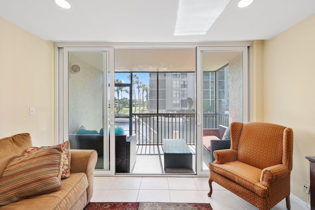 entryway with tile patterned flooring, expansive windows, and recessed lighting