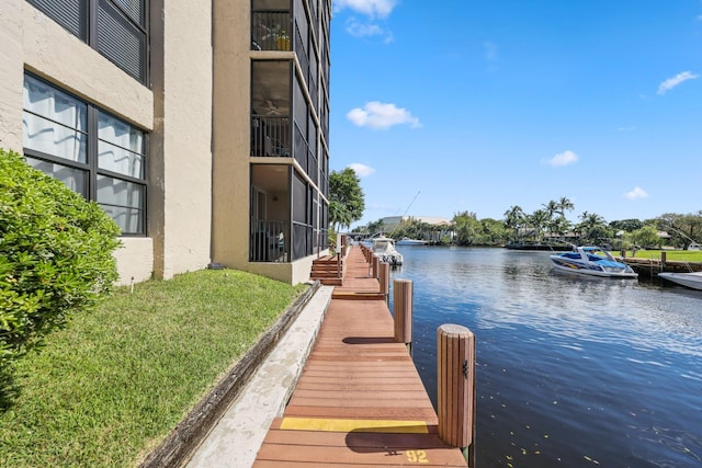 dock area with a water view