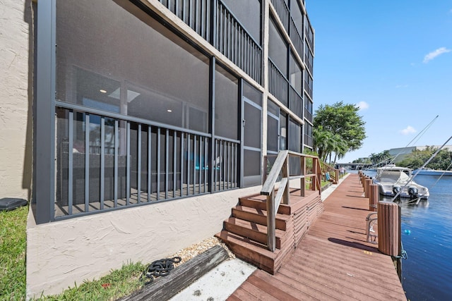 dock area with a water view