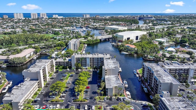 bird's eye view with a view of city and a water view