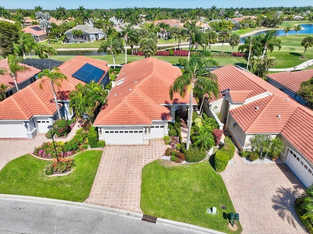 aerial view featuring a residential view and a water view