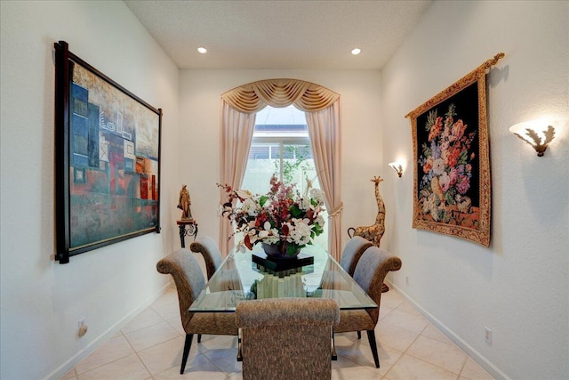 dining space with light tile patterned floors, recessed lighting, and baseboards