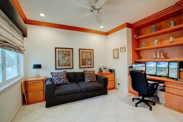 office space featuring baseboards, built in features, ornamental molding, a textured ceiling, and a ceiling fan