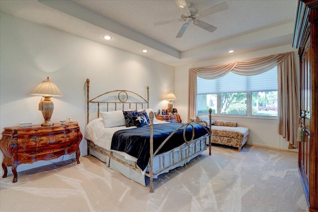 bedroom with baseboards, recessed lighting, a textured ceiling, and carpet