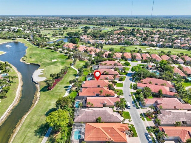 bird's eye view with a water view and a residential view