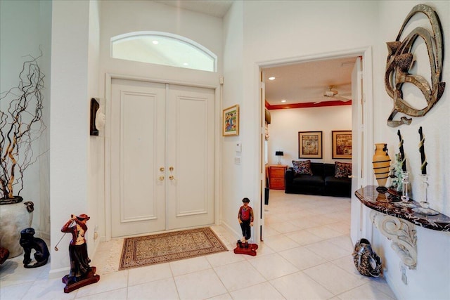 foyer entrance with light tile patterned floors, recessed lighting, and ceiling fan