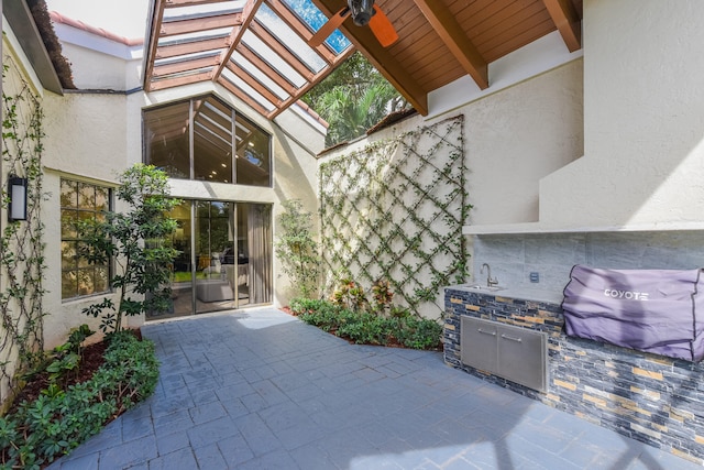 view of patio with exterior kitchen