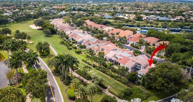 aerial view featuring golf course view and a residential view