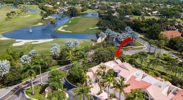 drone / aerial view featuring a water view and golf course view