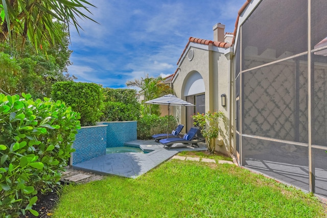 view of yard with a patio area and an outdoor pool