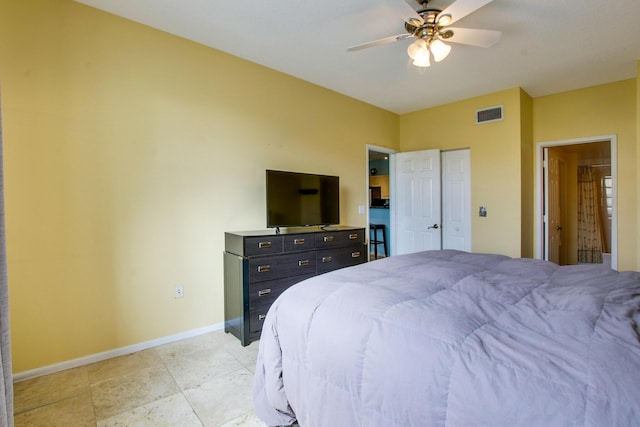 bedroom featuring visible vents, baseboards, and ceiling fan