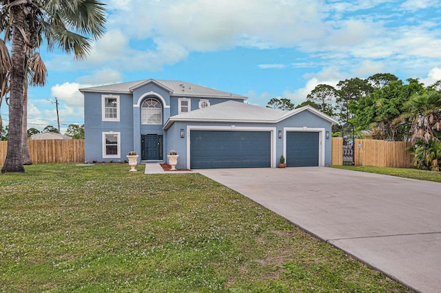 traditional-style home featuring stucco siding, concrete driveway, an attached garage, a front yard, and fence