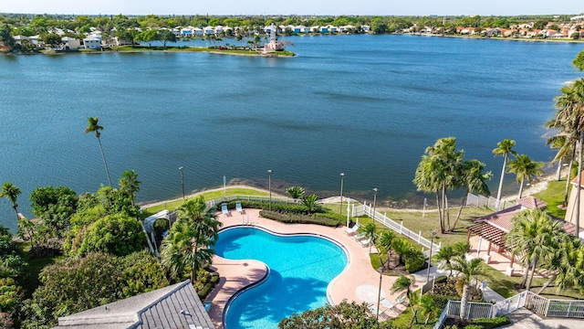 drone / aerial view with a water view