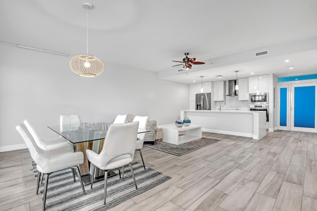 dining space featuring recessed lighting, visible vents, ceiling fan, and light wood finished floors