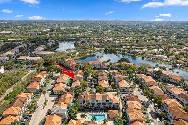 aerial view with a residential view and a water view