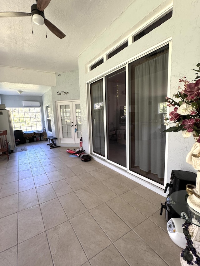 view of patio with ceiling fan and french doors