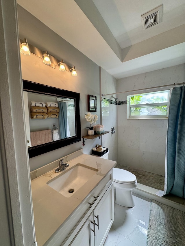 bathroom featuring a stall shower, visible vents, toilet, marble finish floor, and vanity