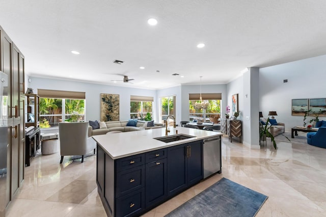 kitchen with light countertops, stainless steel dishwasher, open floor plan, a kitchen island with sink, and a sink