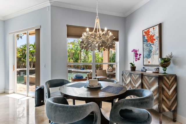 dining area featuring a chandelier and crown molding